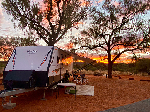 Windsor caravan with sunset background campsite